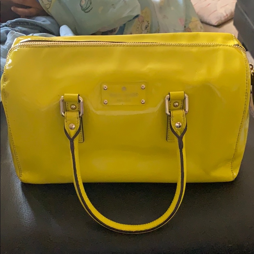 Bright yellow Kate Spade purse